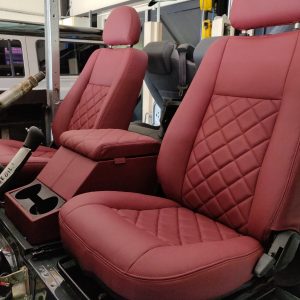 2008 LR LHD Defender 110 Tdci 5 dr building day 16 front seats and cubby installed