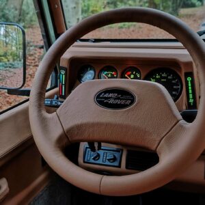 1998 LR LHD Defender 130 Grassmere A steering wheel and dash